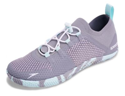 Speedo USA  Unisex Women's Fathom AQ Water Shoes  : Heather Grey: Fathom the possibilities. High-intensity aquatic workouts calls for a performance training shoe. This minimalist pair features lightweight knit construction that molds to the foot for a barefoot feel. Drainage technology ensures less water absorption and quicker drying time  while superior rubber traction keeps you grounded in and out of the pool.